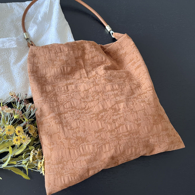 Sac à bandoulière en tissu et cuir Jacquard polyvalent pour centres d'intérêt particuliers