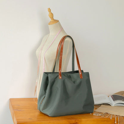 Bolso de hombro informal de gran capacidad para mujer.