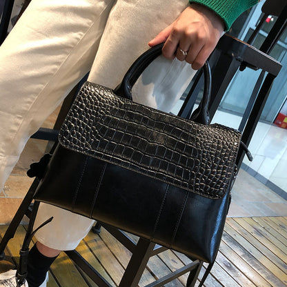 Bolso de mano de cuero puro de gran capacidad, estilo europeo y americano, popular para primavera y verano, venta al por mayor