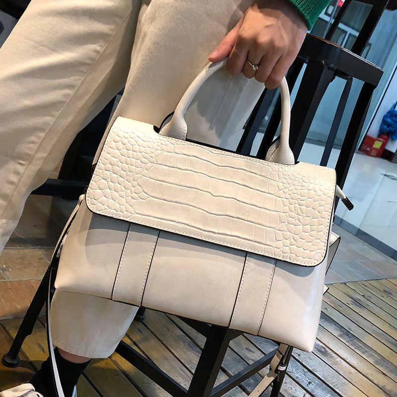 Bolso de mano de cuero puro de gran capacidad, estilo europeo y americano, popular para primavera y verano, venta al por mayor