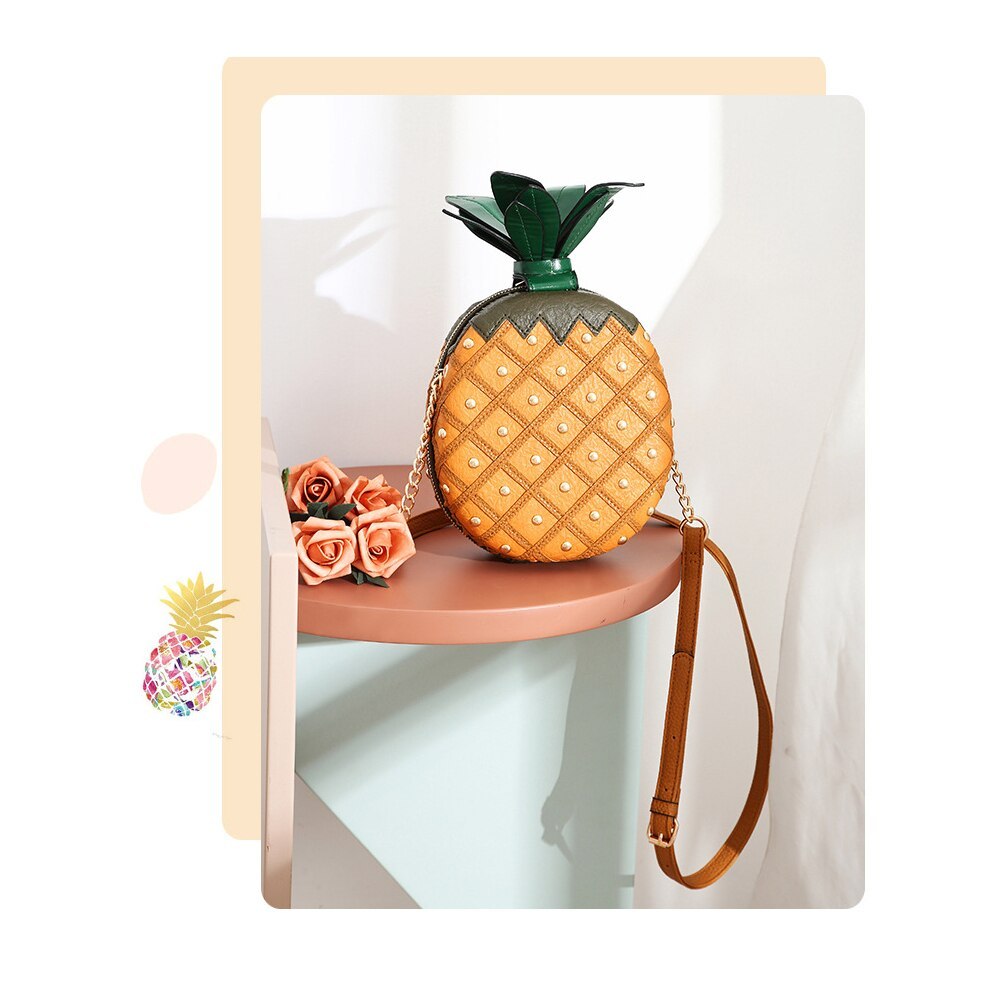 Bolso pequeño redondo con cadena remachada en forma de piña