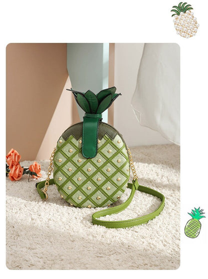 Bolso pequeño redondo con cadena remachada en forma de piña