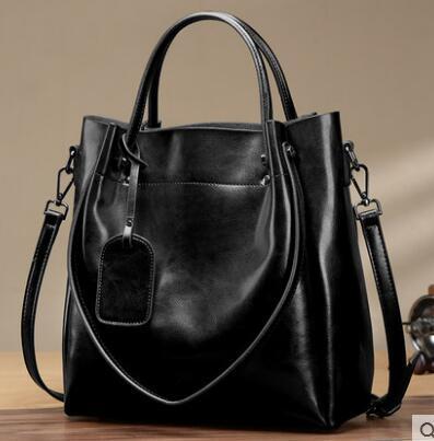 Sac à main en cuir de vachette ciré à l'huile simple et portable pour femme