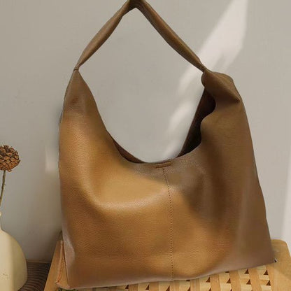 Sac à bandoulière tendance pour femme avec un design spécial