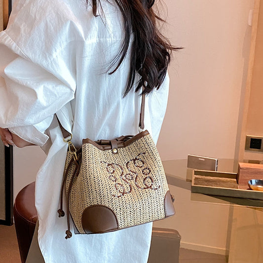 Sac seau tissé en paille pour femme, idéal pour les vacances à la plage ou en bord de mer