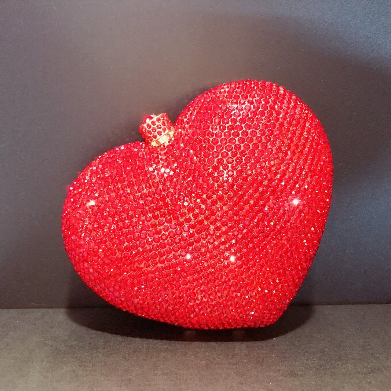 Bolsa de cena con forma de corazón y forma de mano con diamantes