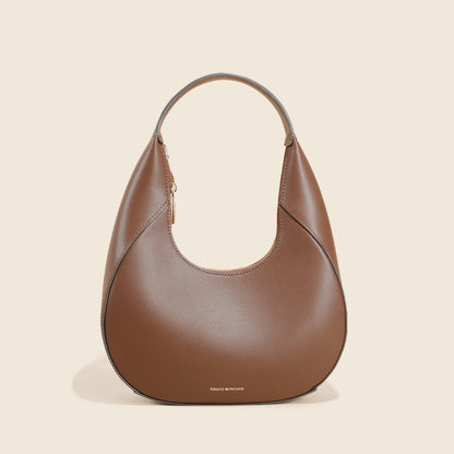 Sac à bandoulière polyvalent pour femme au design spécial en cuir véritable de haute qualité