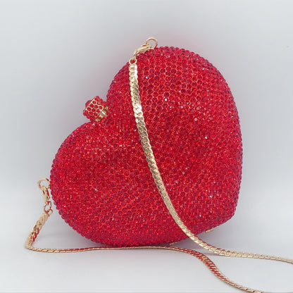 Bolsa de cena con forma de corazón y forma de mano con diamantes