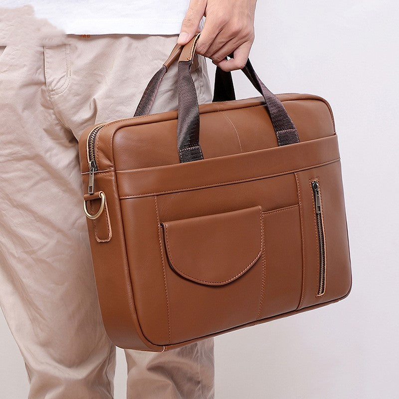 Bolso de mano sencillo e informal de cuero auténtico para hombre