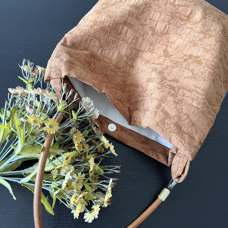 Sac à bandoulière en tissu et cuir Jacquard polyvalent pour centres d'intérêt particuliers