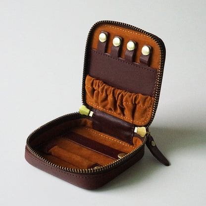 Estuche de maquillaje de cuero vintage con joyero