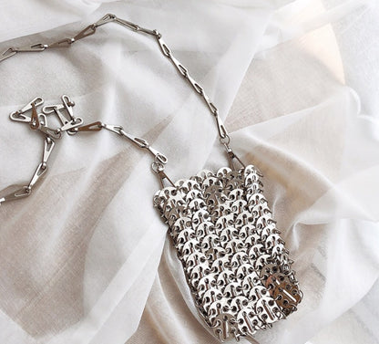 Handmade metal sequin mobile phone bag with concave design