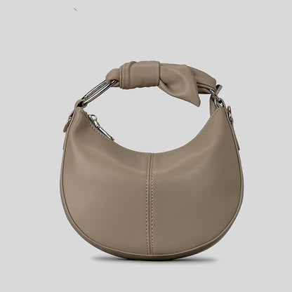 Sac à main en PU souple et simple à la mode pour femme avec coutures de niche nouées