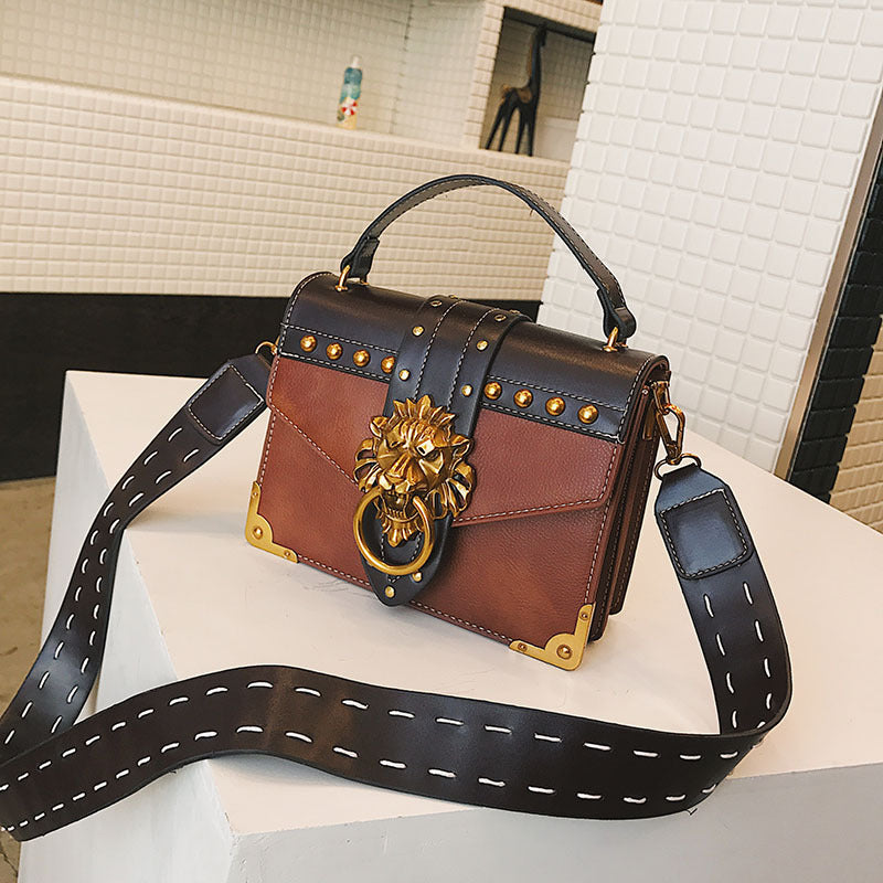 Bolso bandolera de moda para mujer con diseño de cabeza de león de metal