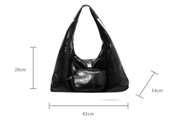 Bolso de mano de mujer de moda que combina con todo