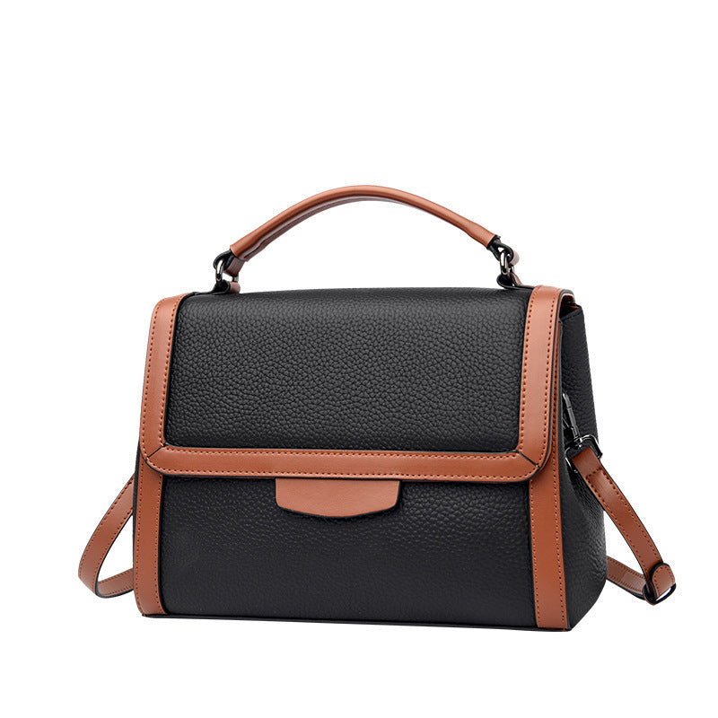 Bolso de mano de cuero suave y texturizado, elegante y moderno