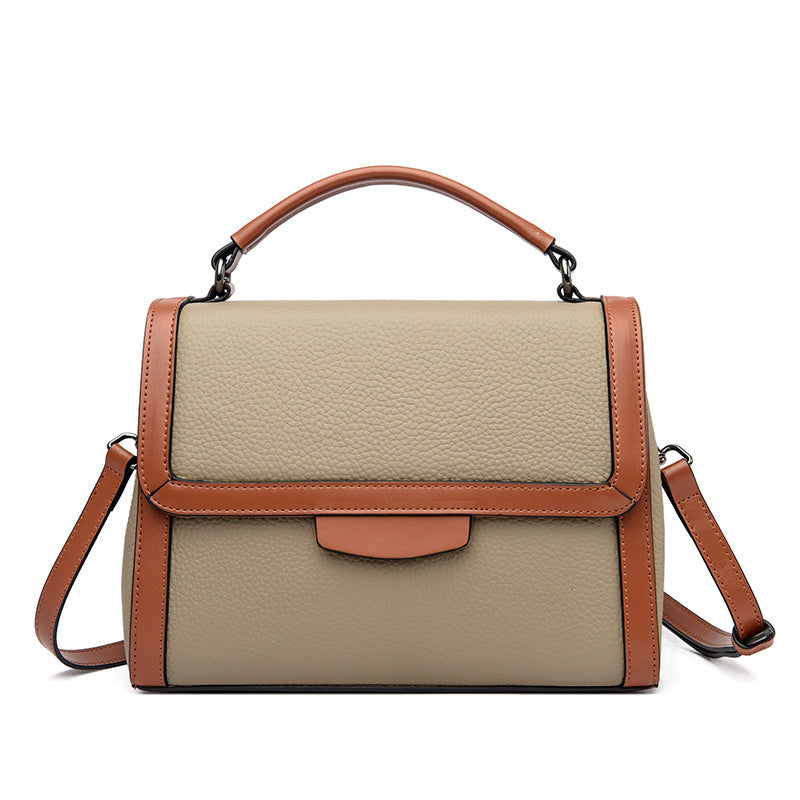 Bolso de mano de cuero suave y texturizado, elegante y moderno