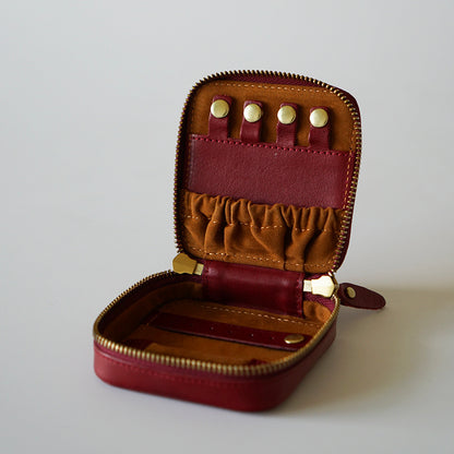 Estuche de maquillaje de cuero vintage con joyero