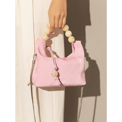 Bolso bandolera con cadena de perlas y hombro Niche