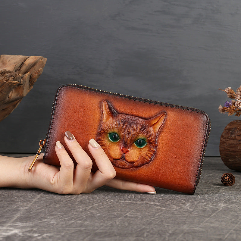 Monedero de piel auténtica con diseño de gato en relieve y ranuras para varias tarjetas