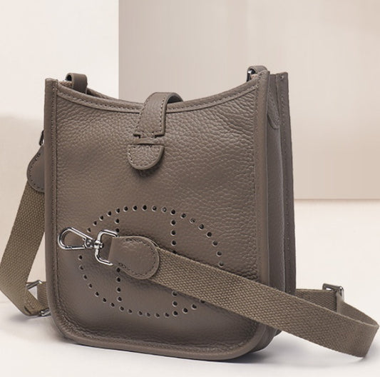 Sac seau creux à bandoulière simple pour femme