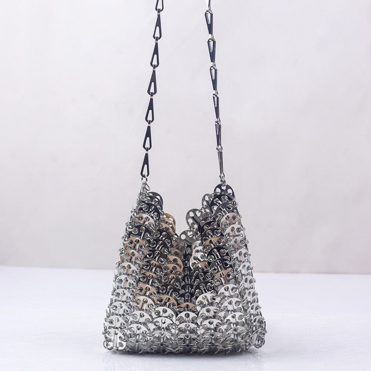 Handmade metal sequin mobile phone bag with concave design