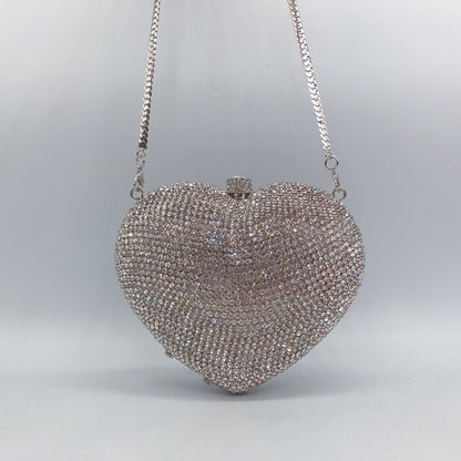 Bolsa de cena con forma de corazón y forma de mano con diamantes