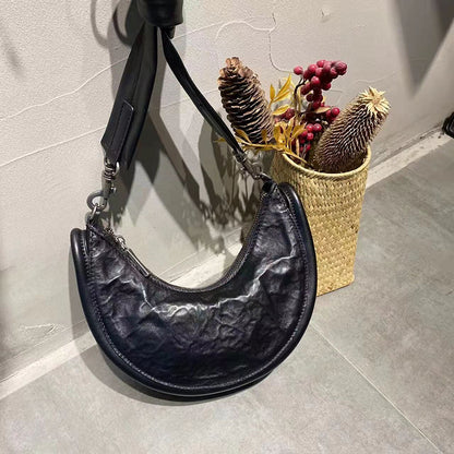 Sac à bandoulière en cuir de vachette plié pour femme