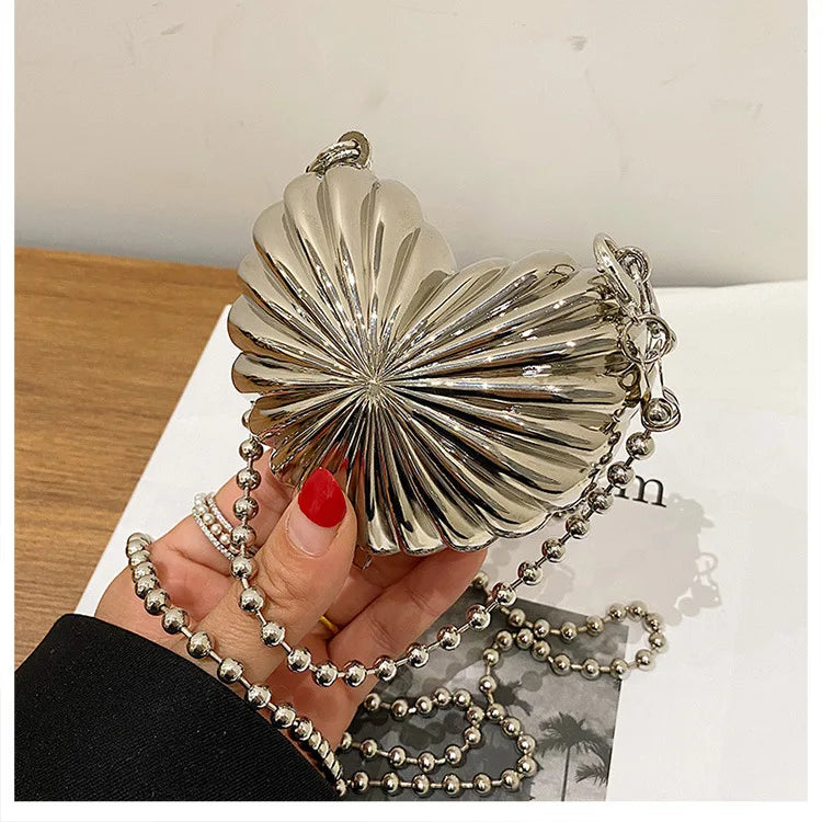 Nuevo y lindo bolso de hombro con forma de corazón de plata con forma de corazón, bolso de mujer con cadena, bolso divertido y versátil, bolsa femenina