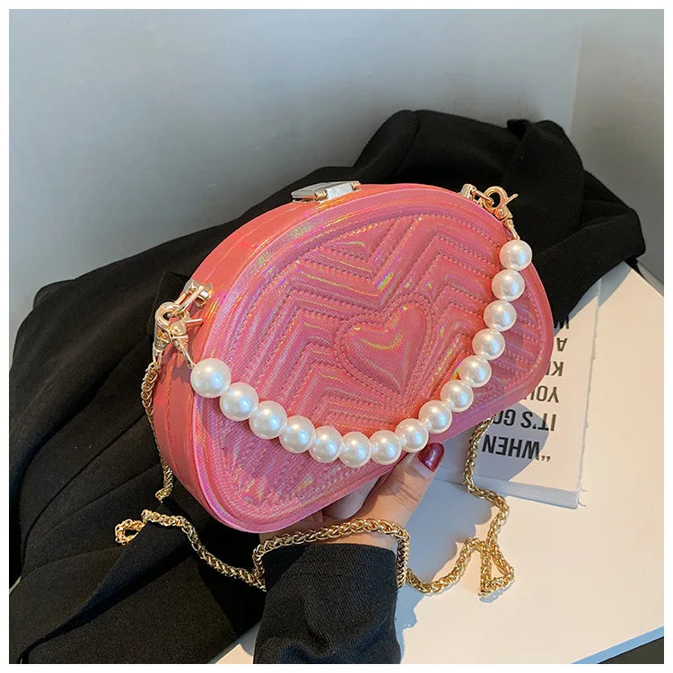 Bolso de mujer de moda 2021 nuevo bolso semicircular con cadena bordada en forma de corazón de melocotón bolso portátil con rayas y perlas