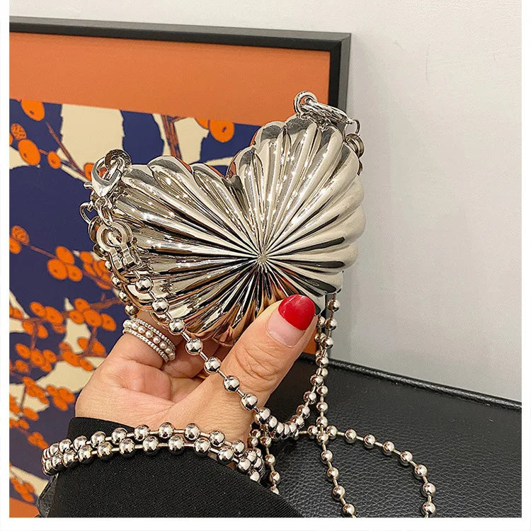 Nuevo y lindo bolso de hombro con forma de corazón de plata con forma de corazón, bolso de mujer con cadena, bolso divertido y versátil, bolsa femenina