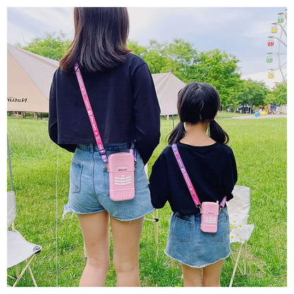 Bolso bandolera estilo teléfono bonito y divertido, novedoso bolso de mano y cartera de gelatina para mujer, bolso cruzado con dibujo de niña, rosa y morado