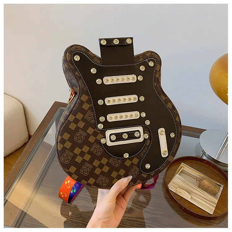 Sac de guitare 2024 Nouveau sac à bandoulière à rivets de mode coréenne Sac à dos populaire pour femmes Instagram