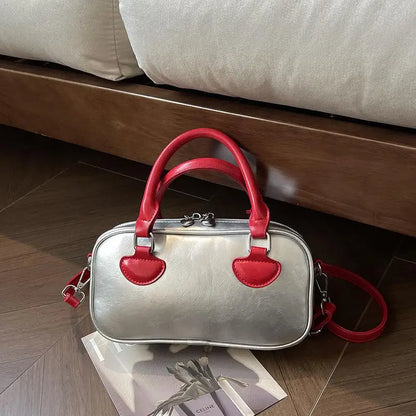 Bolsos de mujer Hit Color 2024 Nuevo bolso de almohada Bolso de mano de cuero de PU Bolso de mensajero de hombro que combina con todo Europa y Estados Unidos