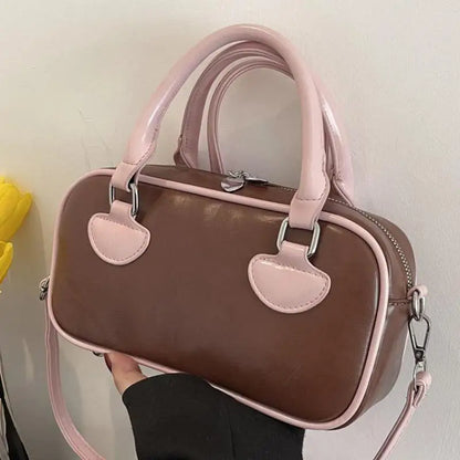 Bolsos de mujer Hit Color 2024 Nuevo bolso de almohada Bolso de mano de cuero de PU Bolso de mensajero de hombro que combina con todo Europa y Estados Unidos