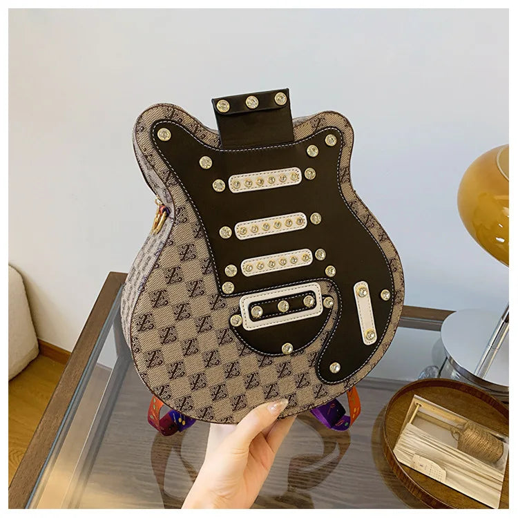 Sac de guitare 2024 Nouveau sac à bandoulière à rivets de mode coréenne Sac à dos populaire pour femmes Instagram