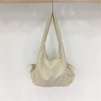 Sac en toile de nylon à mailles creuses d'été 2024, sac fourre-tout décontracté à la mode de marque à une épaule sous les bras, sacs à main de créateur de luxe