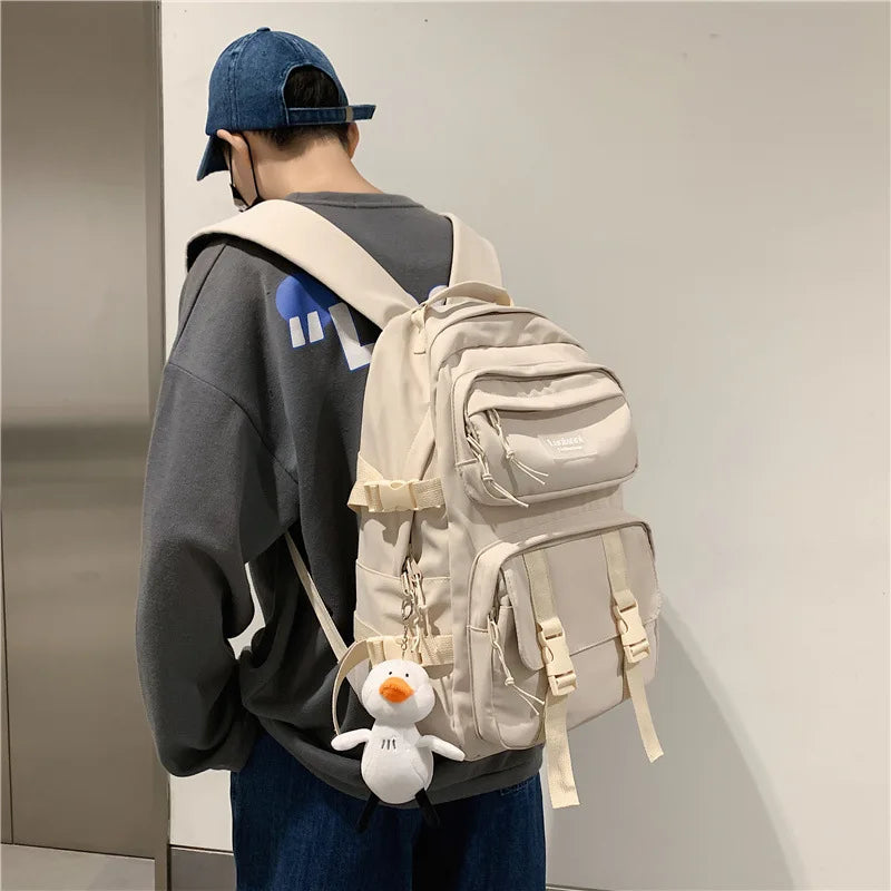 Solid color multi-pocket schoolbag female high school students backpack light color pair large capacity ins backpack male