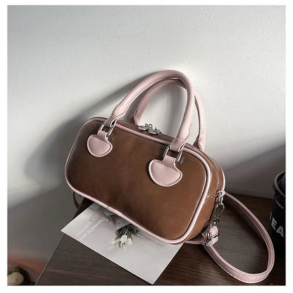 Bolsos de mujer Hit Color 2024 Nuevo bolso de almohada Bolso de mano de cuero de PU Bolso de mensajero de hombro que combina con todo Europa y Estados Unidos