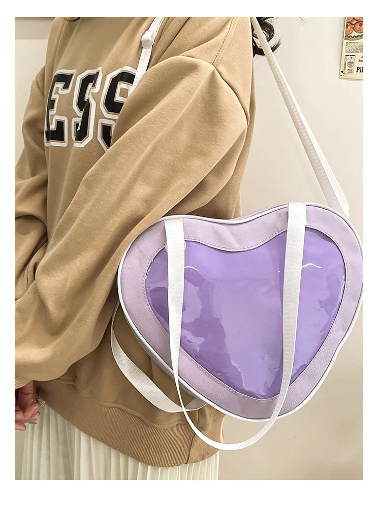 2024 Nouveaux sacs à bandoulière en forme de cœur avec longue poignée pour femmes Sac à main et sac à main de luxe à la mode coréenne pour femmes mignonnes