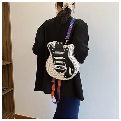 Sac de guitare 2024 Nouveau sac à bandoulière à rivets de mode coréenne Sac à dos populaire pour femmes Instagram