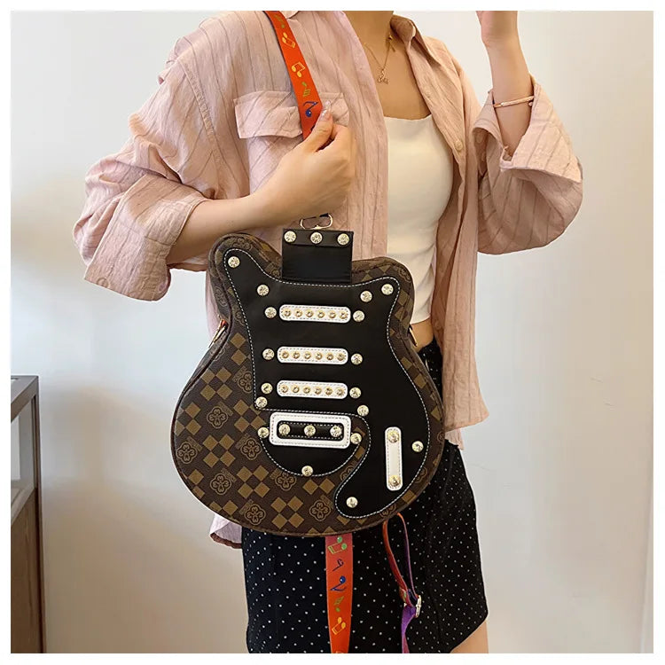 Sac de guitare 2024 Nouveau sac à bandoulière à rivets de mode coréenne Sac à dos populaire pour femmes Instagram