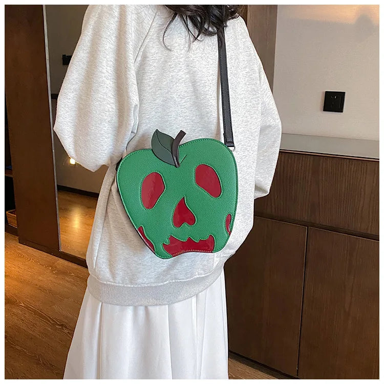 Bolso bandolera con forma de manzana envenenada para Halloween, divertido bolso de hombro, novedoso bolso de mano de piel sintética