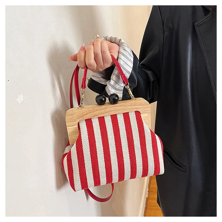 Bolsos de hombro elegantes con diseño de rayas y clip de madera para mujer, bolsos cruzados, carteras de mano para fiesta 2024