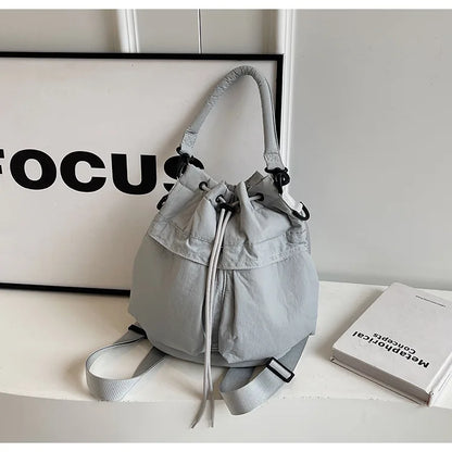 Sac seau décontracté en duvet souple avec cordon de serrage pour femme, sacs à bandoulière rembourrés en nylon léger, sacs à main simples de petite taille, sacs fourre-tout