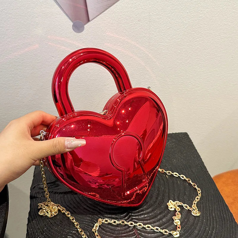 Bolso de acrílico para mujer 2024 nueva moda bolso de mano de color caramelo con forma de corazón bolso bandolera con cadena bolso de hombro