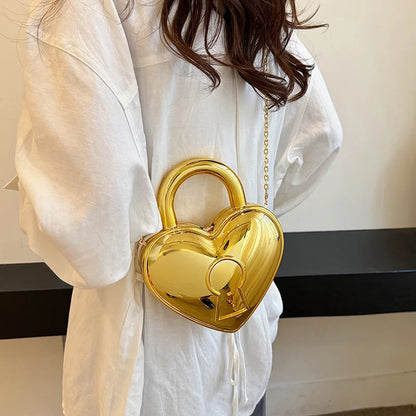 Bolso de acrílico para mujer 2024 nueva moda bolso de mano de color caramelo con forma de corazón bolso bandolera con cadena bolso de hombro