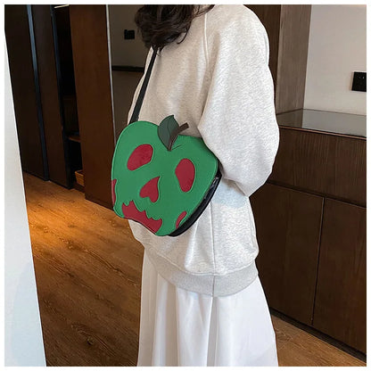 Bolso bandolera con forma de manzana envenenada para Halloween, divertido bolso de hombro, novedoso bolso de mano de piel sintética