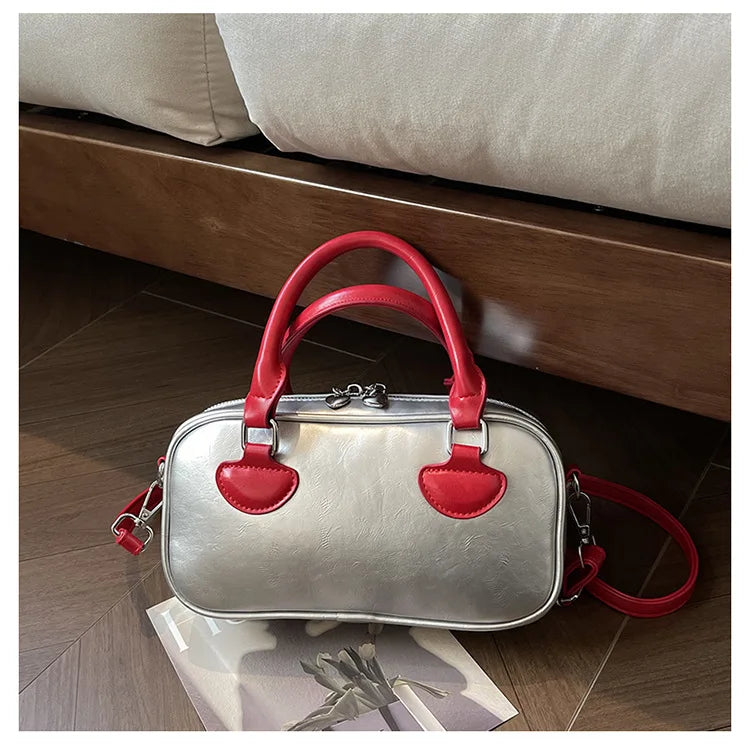 Bolsos de mujer Hit Color 2024 Nuevo bolso de almohada Bolso de mano de cuero de PU Bolso de mensajero de hombro que combina con todo Europa y Estados Unidos