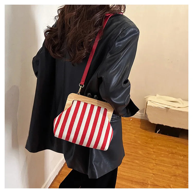 Bolsos de hombro elegantes con diseño de rayas y clip de madera para mujer, bolsos cruzados, carteras de mano para fiesta 2024